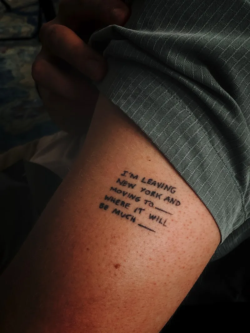 Tatouage citation manuscrite sur bras